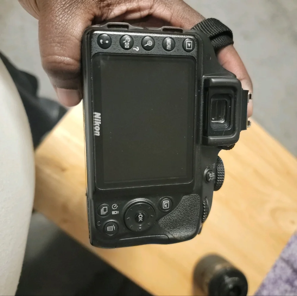 Nikon D3300, 18-55mm lens, 55-200mm lens, and power adapter